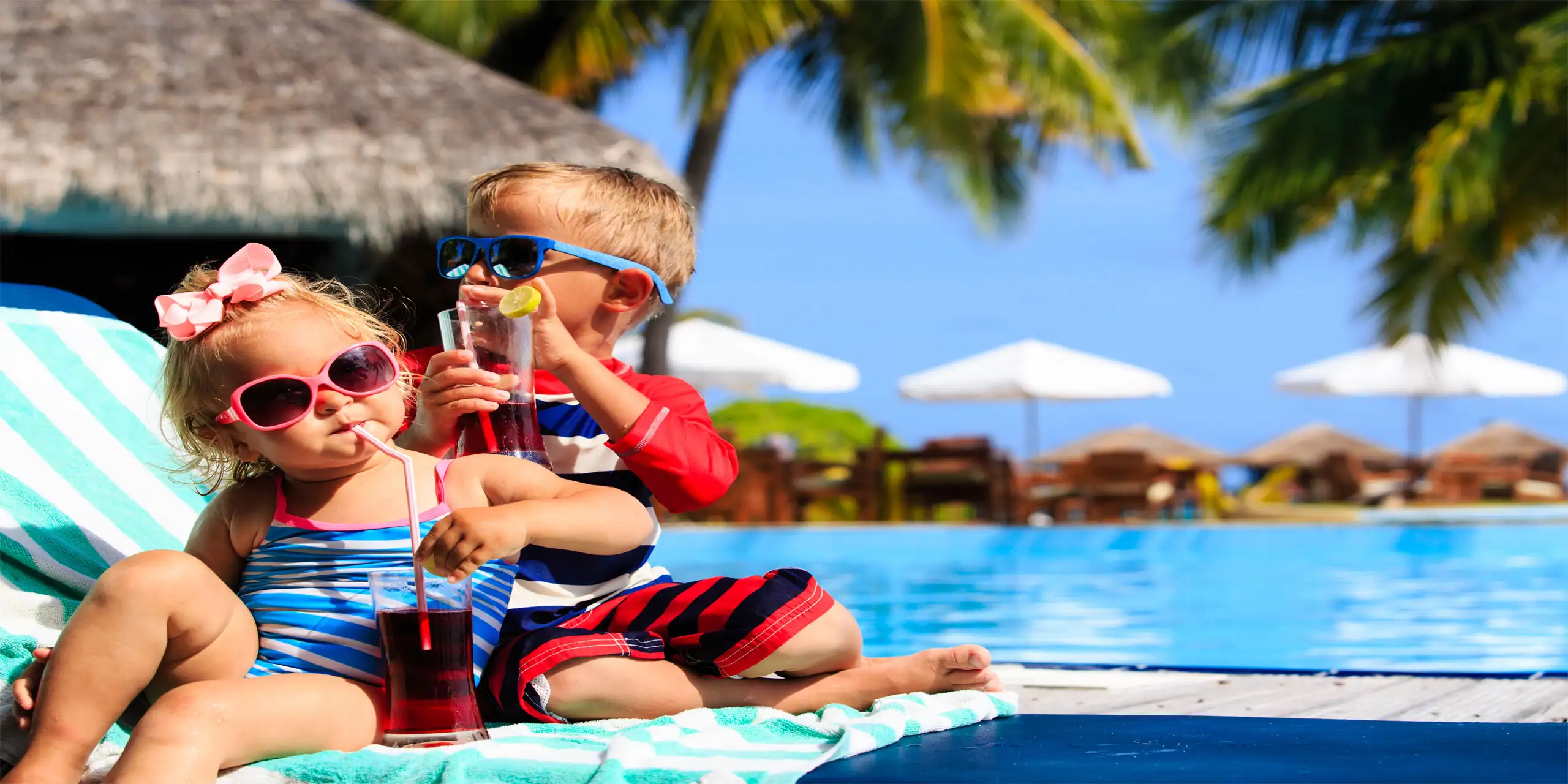 Toddlers At Resort; Courtesy of Nadya Eugene/shutterstock.com